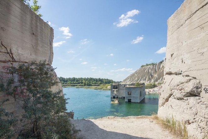 Freedive in sunken prison - Sunken prison: flooded buildings, machinery, and that eerie fence line