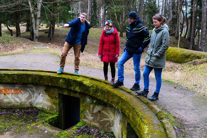 Small-Group Half-Day Tour of Rummu and Coastal Cliffs - Rummu quarry: submerged waters, sand dunes, and the Soviet prison connection